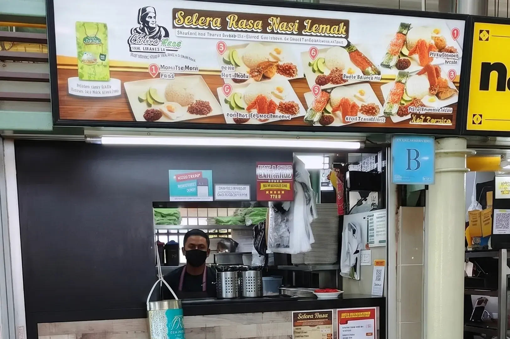 Selera Rasa Nasi Lemak food stall storefront with a menu board showing various rice dishes.